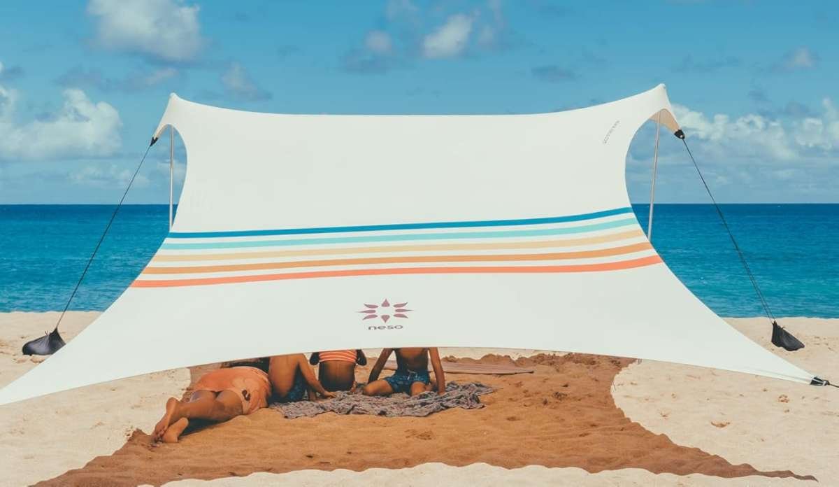 Portable 7x7ft Beach Tent with Sand Anchor, UPF50+ Protection, and Rei